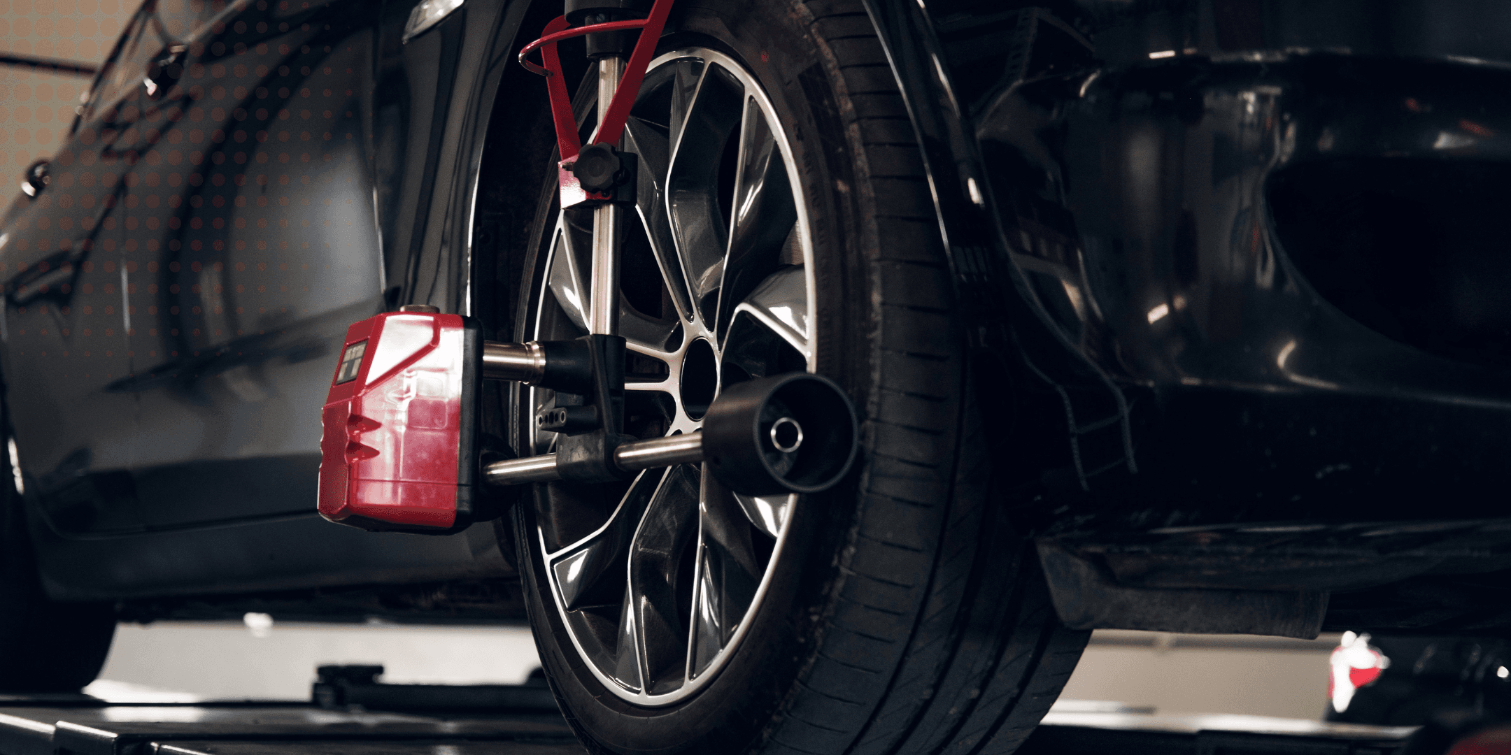 Wheel alignment equipment on a car